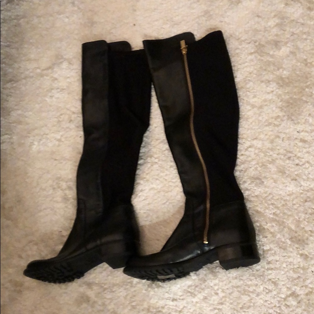 Tall black leather boots